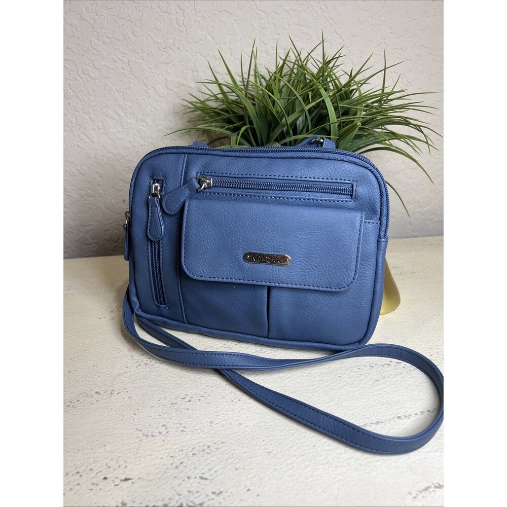 Multisac blue crossbody shoulder bag with multiple compartments Travel On The Go